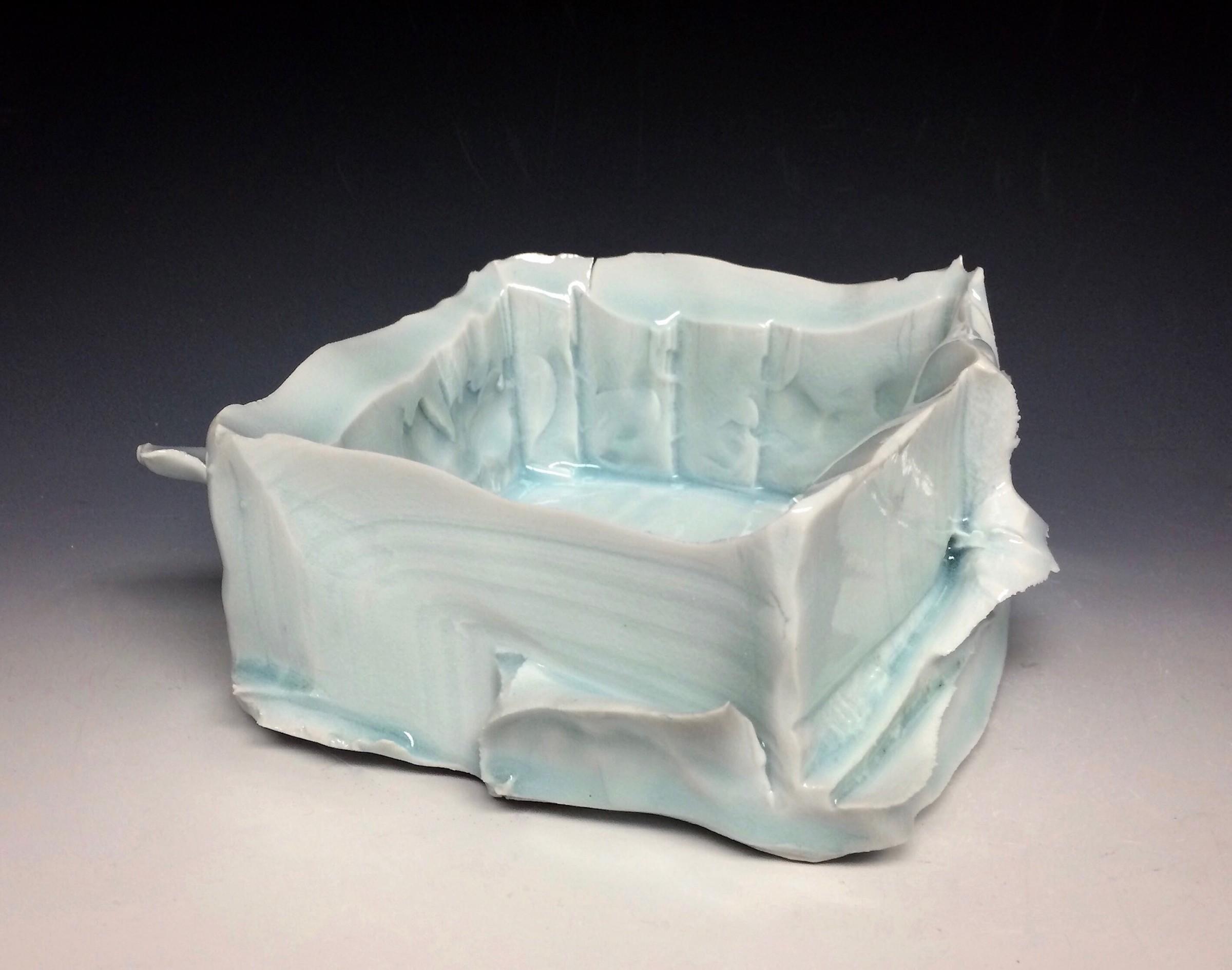 Ceramic sculpture of iceberg vessel by artist John Oles.